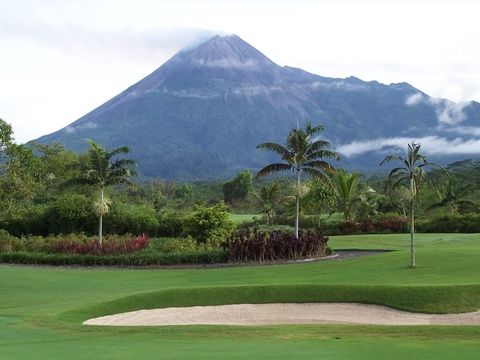 Merapi Golf course with the volcano rising behind the fairway — 18 holes on the southern slopes