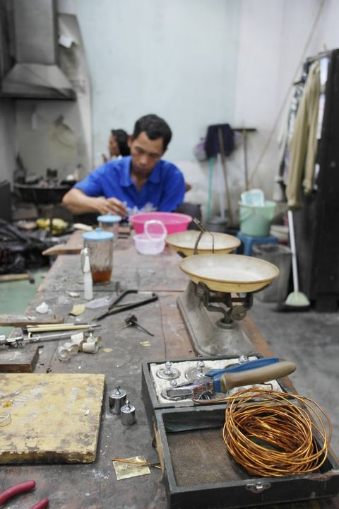 Silversmith at work in a workshop in Kota Gede, Yogyakarta's silversmiths' quarter