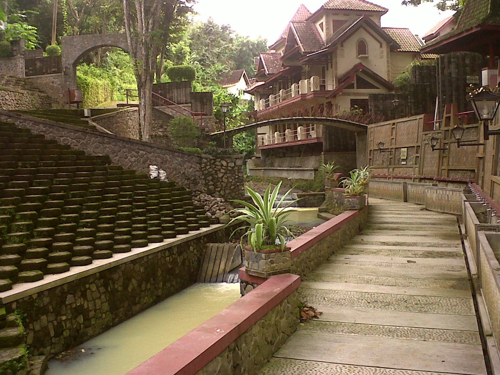 The 1929 statue of the Virgin Mary and the sacred spring at the Sendangsono pilgrimage site in the Menoreh hills