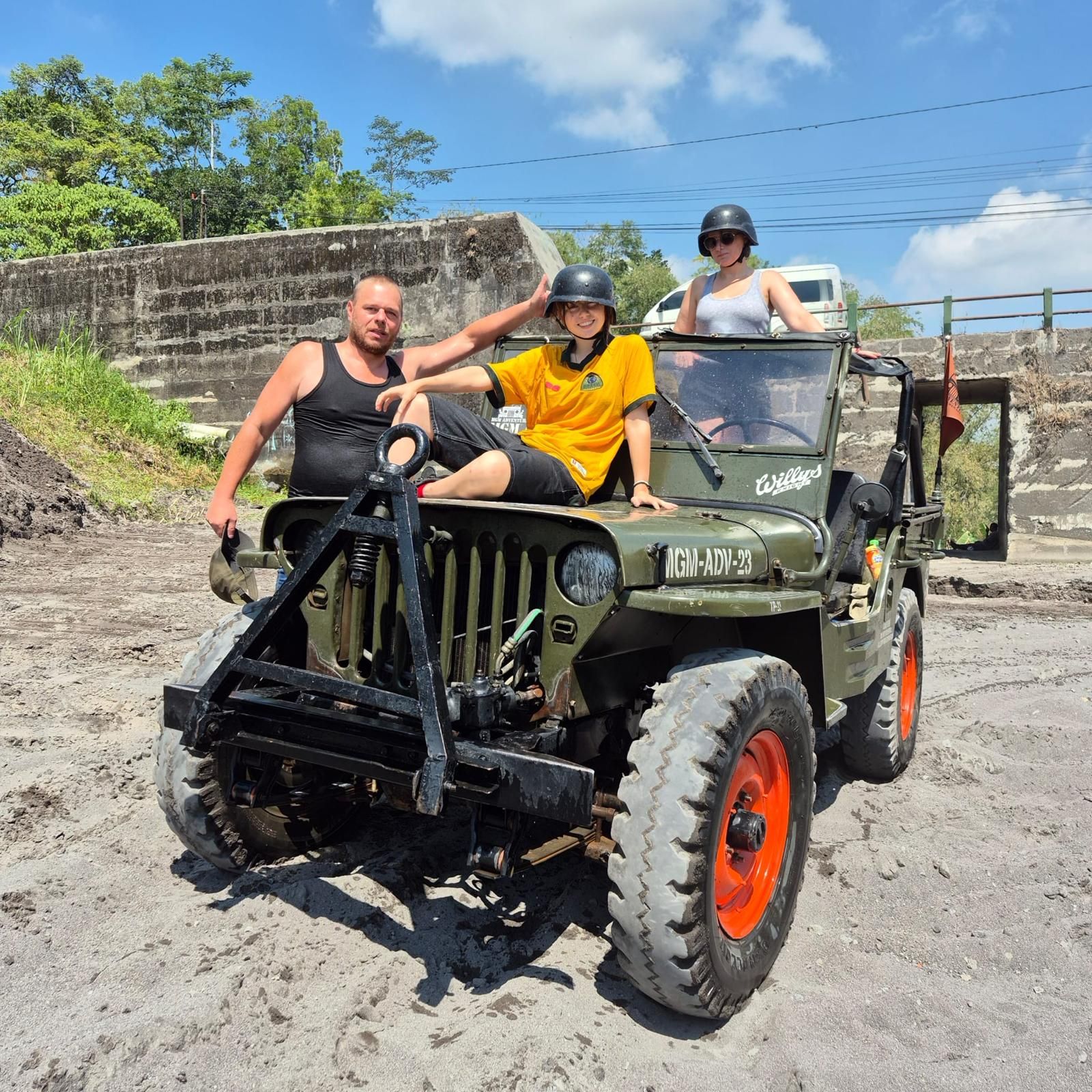 Family on a Merapi lava tour jeep safari on the volcanic slopes
